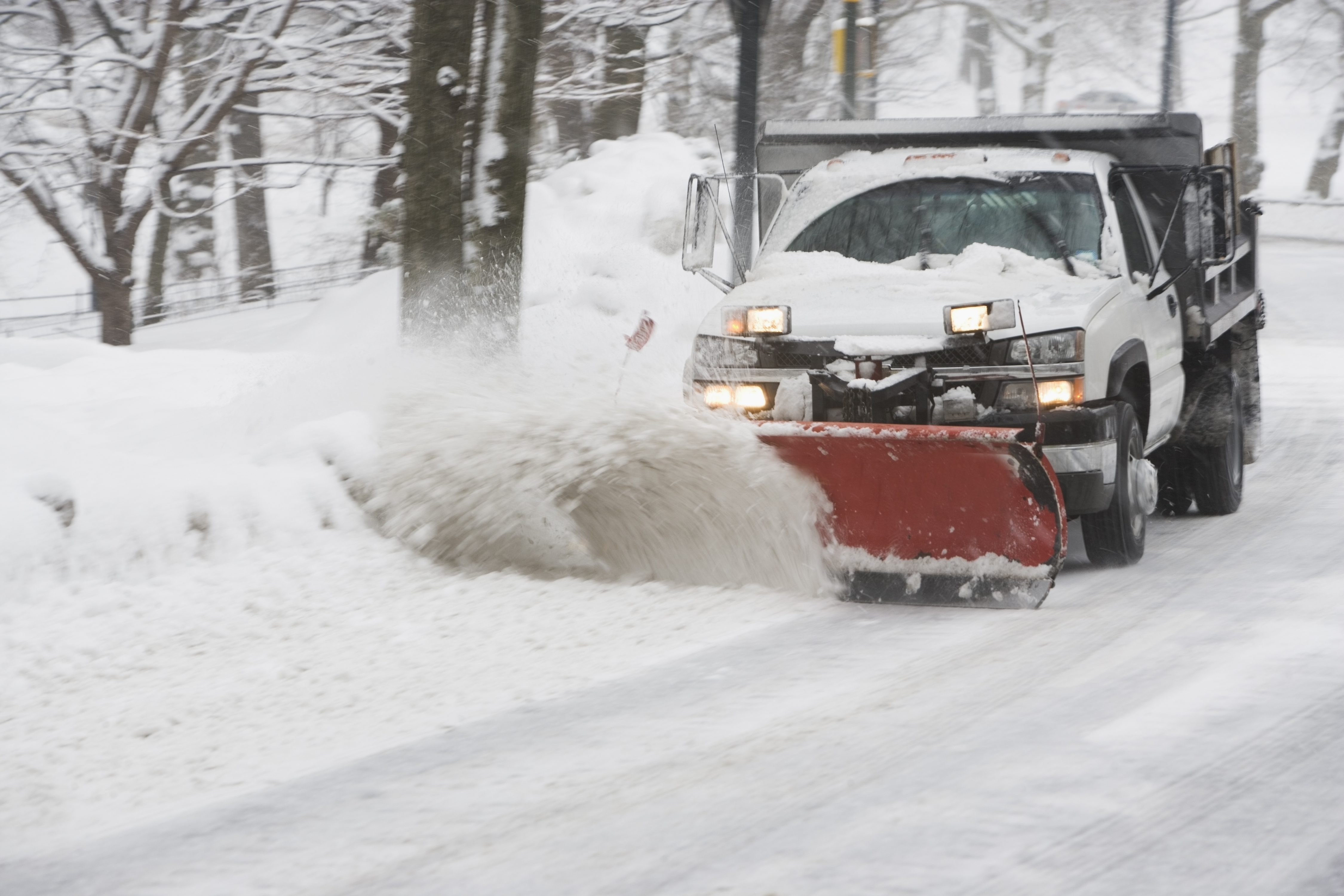 Truck plowing snow. (Getty Images)