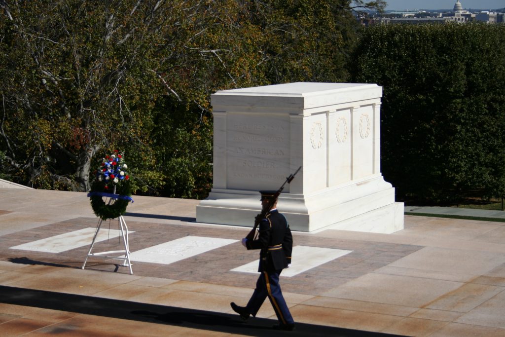 The Tomb of the Unknown Soldier at Arlington National Cemetery, with honor guard marching. (Getty Images)