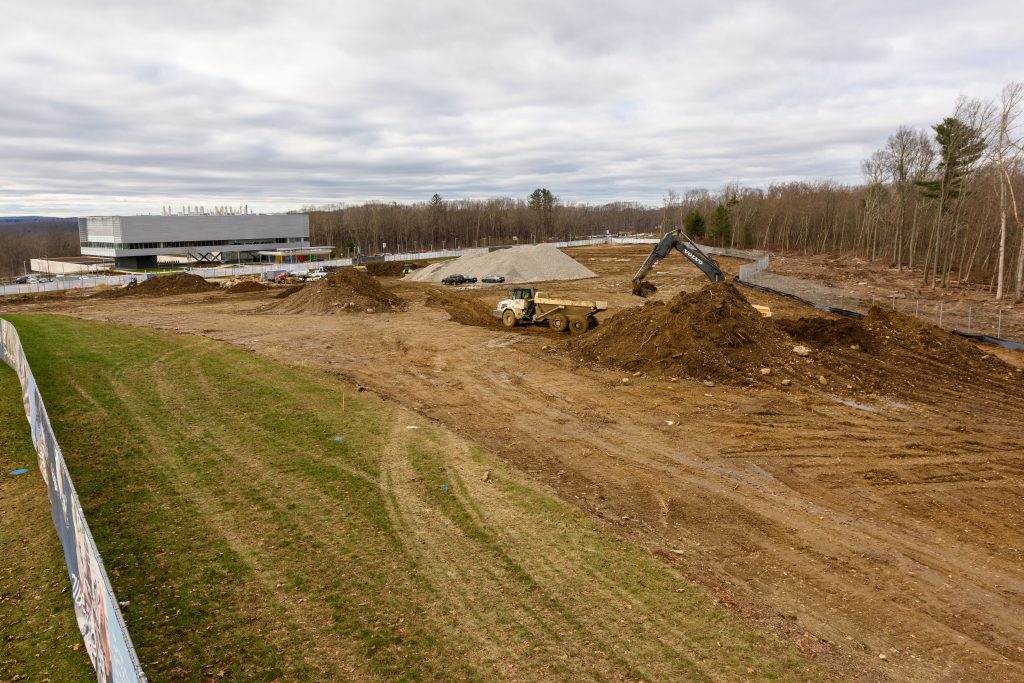 A 700-space parking lot under construction on Discovery Drive is part of a plan for significant changes in parking arrangements at the north end of campus, starting in summer 2019. (Peter Morenus/UConn Photo)