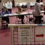 UConn students and town residents are given separate registration tables. (Lucas Voghell ’20 (CLAS)/UConn Photo)