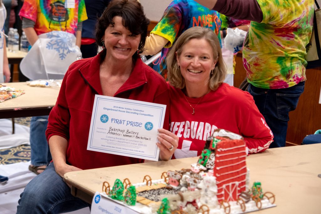 Peggy Myers, left, and Sarah Darras, representing the Women’s Basketball program, took home First Prize for their creation. (Lucas Voghell ’20 (CLAS)/UConn Photo)