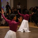 Abigail Livingston ’21 (CLAS), a math major, and Sidney Turnier ’19 (NUR), perform a dance representing African culture in America. (Lucas Voghell ’20 (CLAS)/UConn Photo)