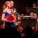 Teryn Kuzma '19 (SFA), recipient of the Aria Award in this year's Concerto Competition, received a standing ovation for her performance with the UConn Symphony Orchestra on Dec. 6. (Lucas Voghell ’20 (CLAS)/UConn Photo)