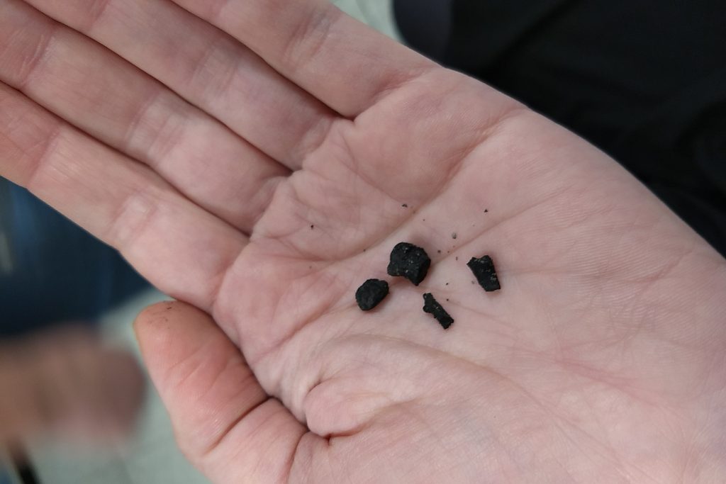 Fragments of charcoal from 9,000 years ago suggest a forest fire. (Tom Rettig/UConn Photo)