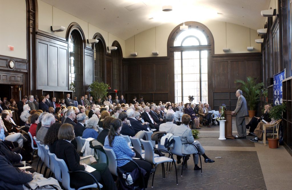 Norman Stevens, former director of university libraries, speaks at the rededication ceremony of the Wilbur Cross Building in 2003.