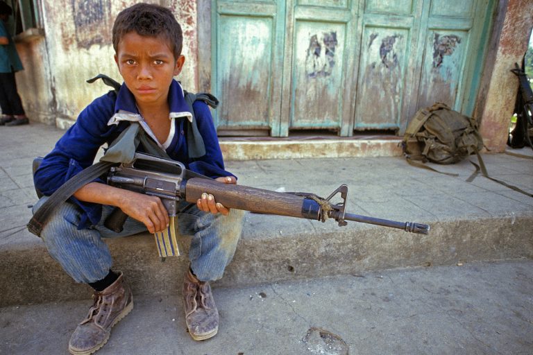 Scott Wallace, associate professor of journalism, discusses his experiences as a war reporter. (Photo by Scott Wallace)