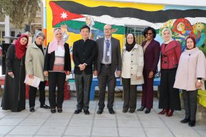 Dean Kersaint, third from right, and Yuhang Rong, third from left, visit Jordan this past fall to connect with educators, administrators, and students at and beyond Queen Rania Teach Academy to learn more about the success of the Academy’s implementation of a principal training program based on UCAPP. (Photo courtesy of Queen Rania Teacher Academy)