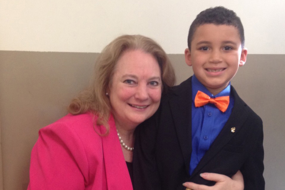Court-appointed special advocate Susan Brillhart with one of her charges, Anthony, on the day he was adopted. His new family stays in touch. (Photo courtesy of Susan Brillhart)