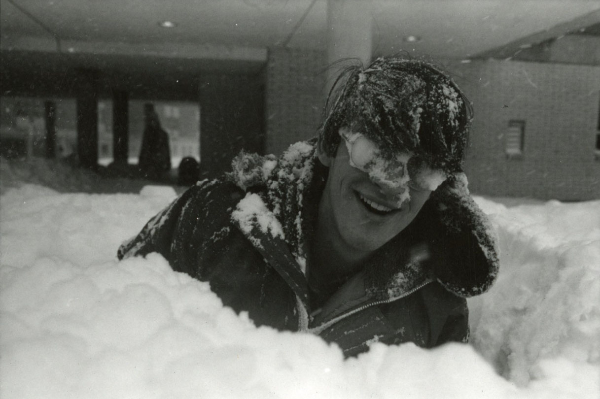 A student enjoys the snow on campus during the blizzard of 1978. (Photo from University Library Archives & Special Collections)
