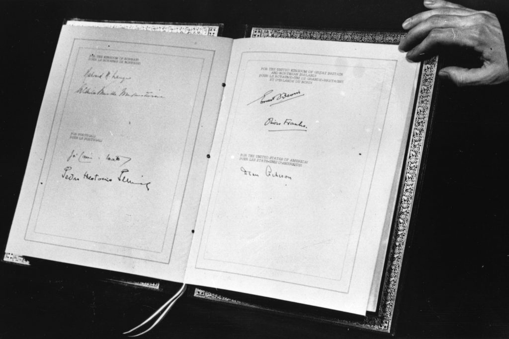 The April 4, 1949 document that established the North Atlantic Treaty Organization, showing the signatures of foreign secretaries and ambassadors of the original signing nations – Belgium, Britain, Canada, Denmark, France, Iceland, Italy, Luxembourg, the Netherlands, Norway, Portugal, and the United States. NATO was established for the purposes of collective security. Because the document was signed in the U.S., the signature of Secretary of State Dean Acheson is the last to appear. (Photo by Keystone/Getty Images)