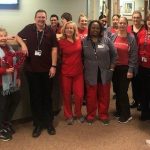 UConn dermatology staff wearing red