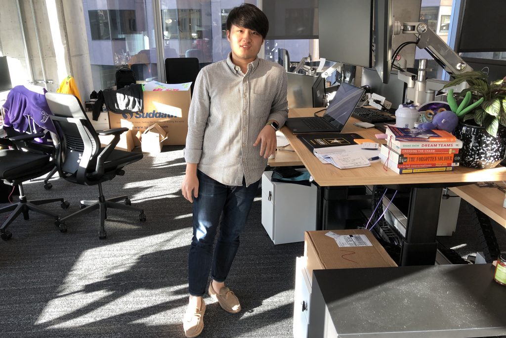 Jimmy Tang '11 (BUS), in his office at the Twitch headquarters in San Francisco. (Photo courtesy of Jimmy Tang)