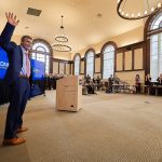 Thomas Katsouleas waves as he enters the Wilbur Cross North Reading Room, following his appointment to be the 16th University president on Feb. 5, 2019. (Peter Morenus/UConn Photo)