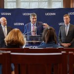 Thomas Katsouleas, center, speaks at a press conference following his appointment to be the 16th president of the University on Feb. 5, 2019. At left is board chair Thomas Kruger. At right is Gov. Ned Lamont. (Peter Morenus/UConn Photo)