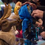 Matthew Sorenson, an MFA student in puppet arts, demonstrates how the puppets work. (Lucas Voghell '20 (CLAS)l/UConn Photo)