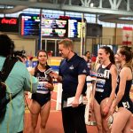 Three Huskies, from left Talia Staiger, Mia Nahom, and Allie Alsup, were interviewed after going 1, 2, 3 in their heat in the qualifying round of the mile run. (Ben Solomon/AAC Photo)