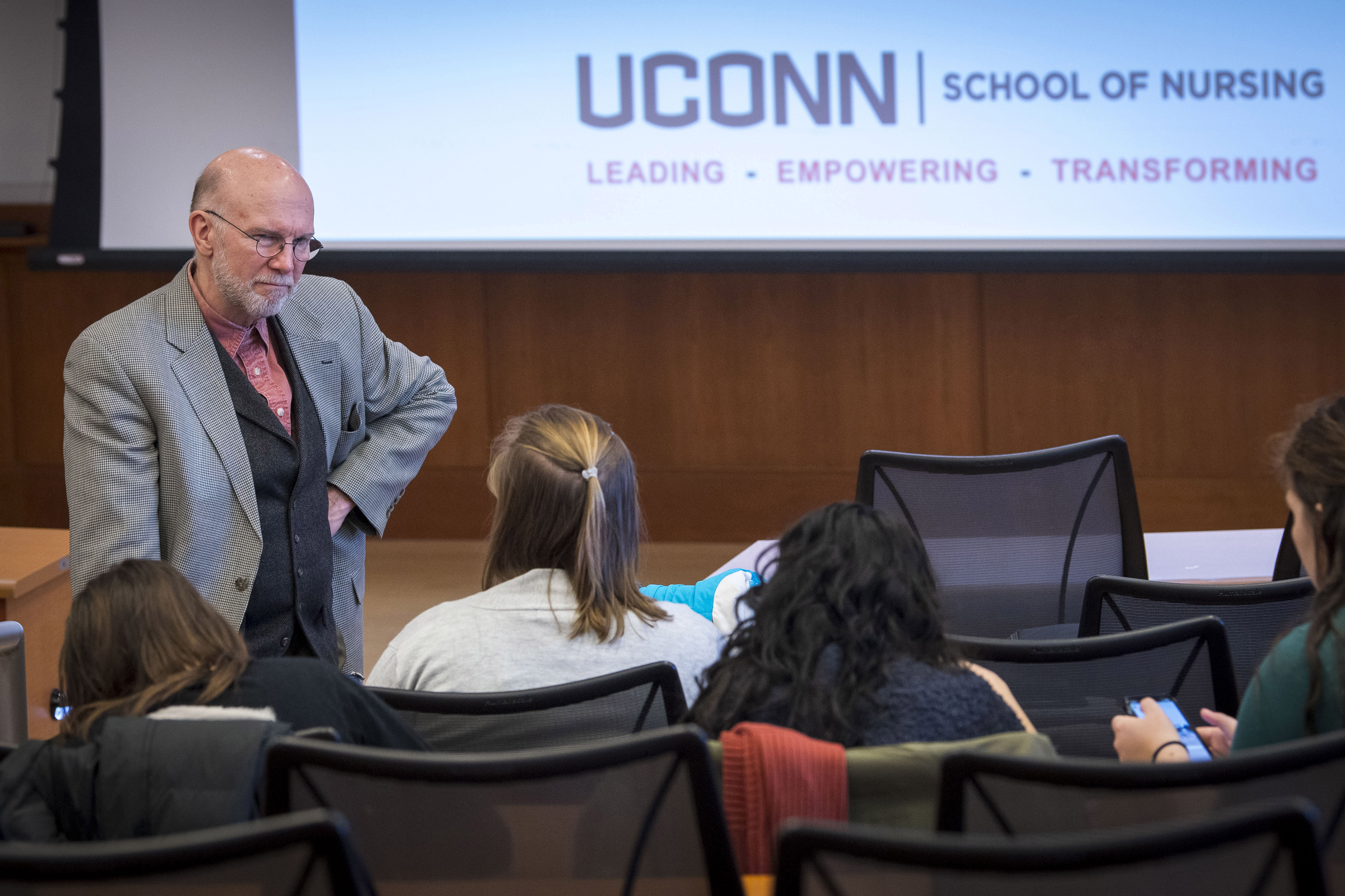 Professor Tom Long gives a lecture in the Widmer Wing of the School of Nursing. (Sean Flynn/UConn Photo)