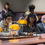 Nandan Tumu, left, a representative of the Undergraduate Student Government and the Board of Trustees, testifies, as Akshayaa Chittibabu, listens, during testimony to the Appropriations Committee of the Connecticut General Assembly on March 7. (Ariel Dowski for UConn)