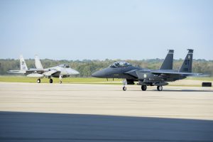 A pair of F-15 Eagles from Eglin Air Force Base, Florida, taxi after landing at Wright-Patterson Air Force Base, Ohio in preparation for landing and safe haven, Oct. 9, 2018. The F-15 is one of several planes taking safe haven at Wright-Patterson AFB, as Hurricane Michael threatens their home station. (U.S. Air Force photo by Wesley Farnsworth)