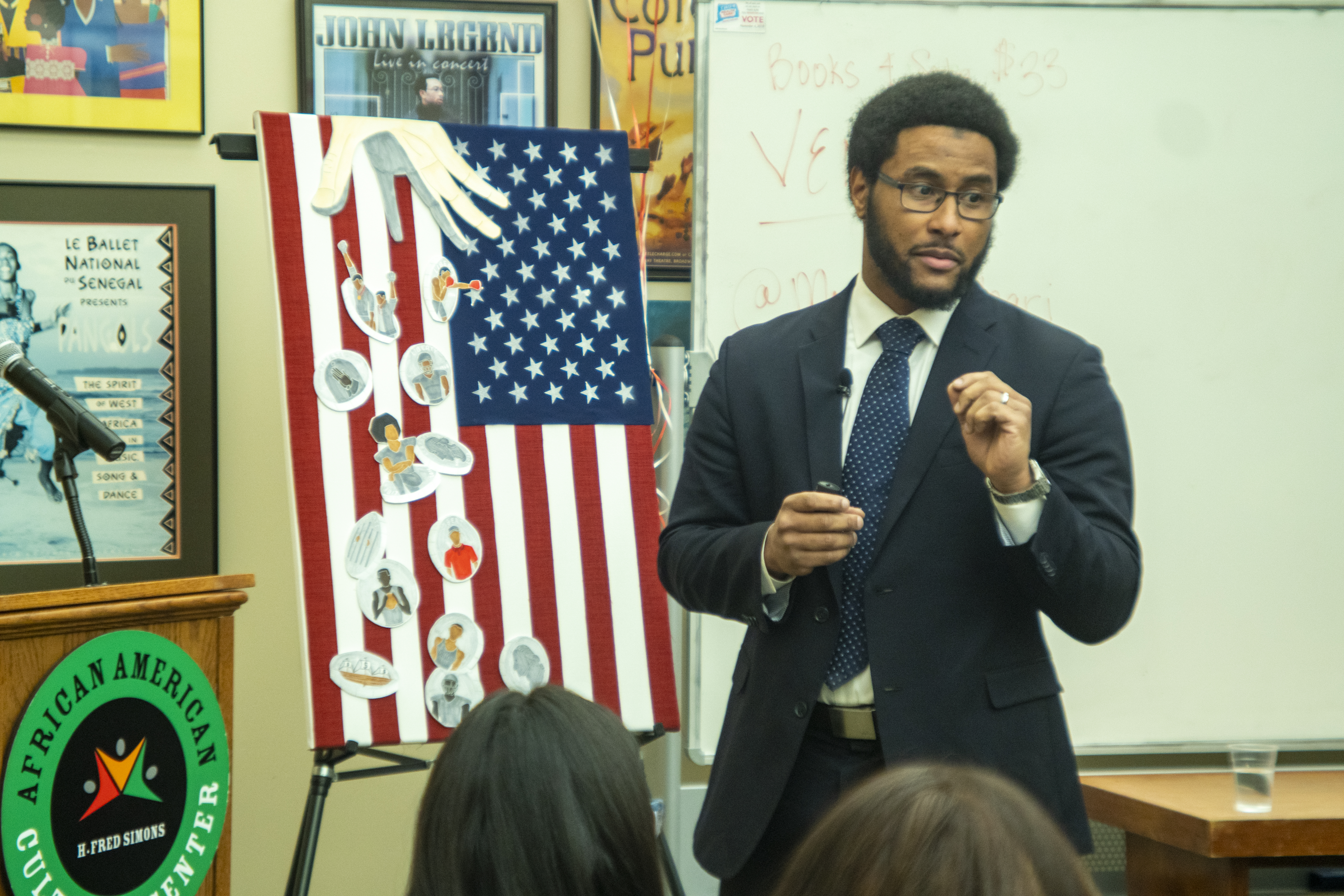 Joseph Cooper shares insights about his newly released book during a book launch event held in Storrs last month. (Eve Lenson/Neag School)