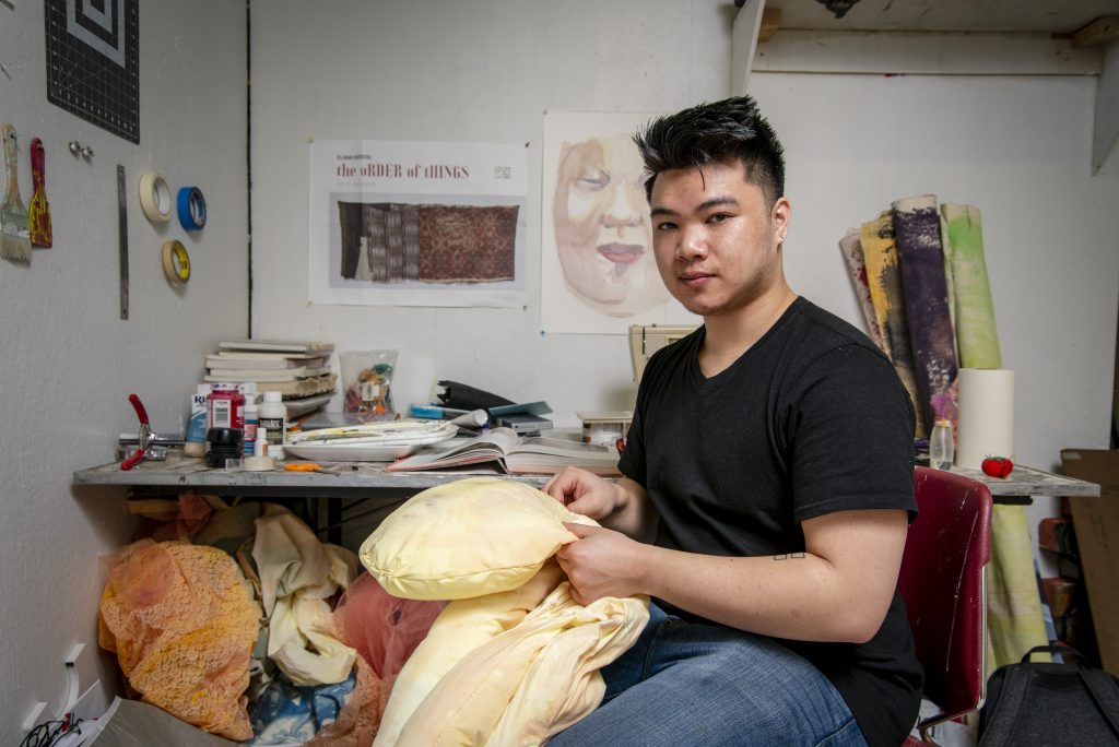 James Keth ‘19 (SFA) working on his senior project in his studio at the School of Fine Arts, Art Building on March 25, 2019. (Sean Flynn/UConn Photo)