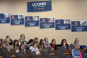 Nursing students listen to a lecture in the Widmer Wing of the School of Nursing. (Sean Flynn/UConn Photo)
