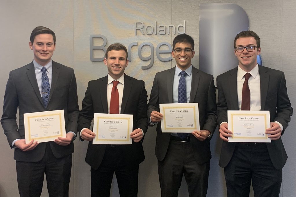 Left to right, John McLaughlin, John Brindisi, Keyur Shah, and Matthew Frank accepting their awards at the "Case for a Cause" competition (Photo courtesy of John McLaughlin)
