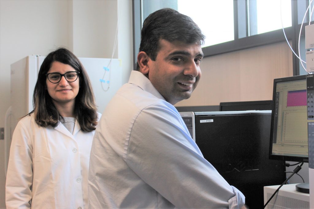 Raman Bahal and Ph.D. candidate Shipra Malik in the lab.