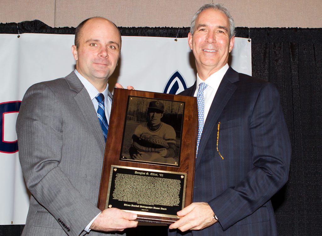 Coach Jim Penders (left) with Doug Elliot '82 (BUS).