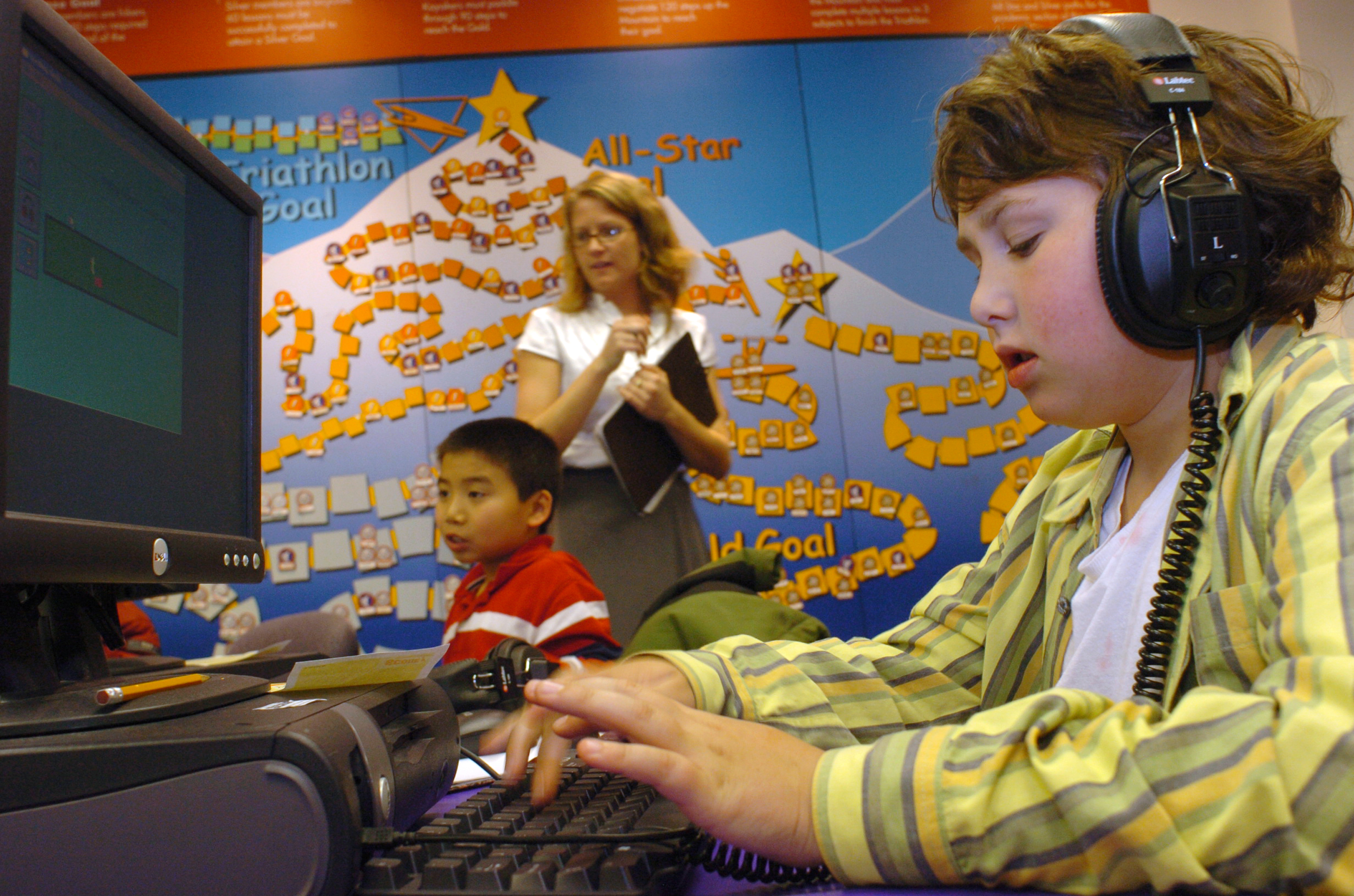 A fifth-grader works at a computer during an after-school learning program. (Farah Nosh/Getty Images)
