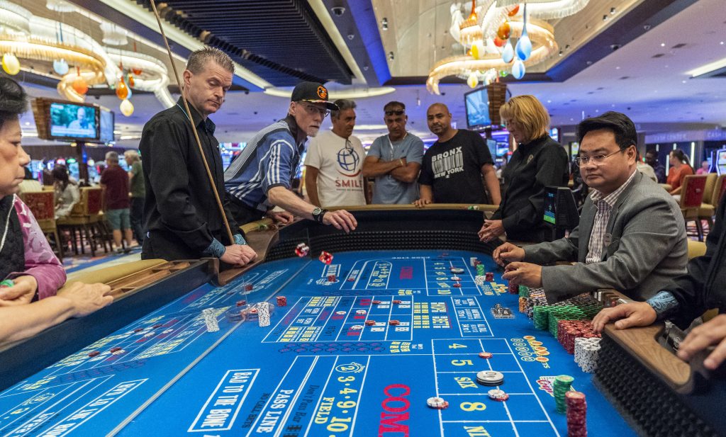 Patrons gamble inside the Hard Rock Hotel and Casino in Atlantic City, New Jersey. The Hard Rock is one of two new casinos that opened last year in the seaside resort. (Jessica Kourkounis/Getty Images)