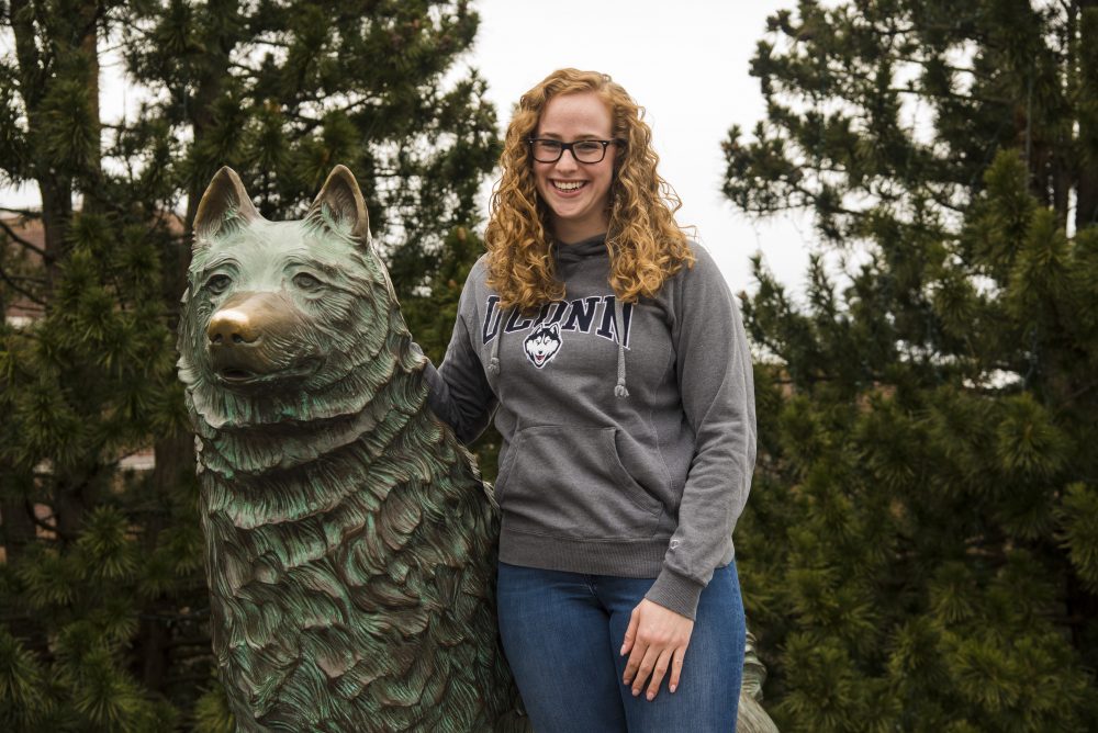Kathrine Grant in front of the UConn Husky statue. (Submitted Photo)