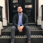 Omaniel Ortiz '20 (CAHNR) sitting on the steps of the apartments where the UConn group lived in London, an area known as Little Venice. The neighborhood, built in the early to mid-19th century, gets its name from its location near the junction of two canals.