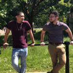 Omaniel Ortiz '20 (CAHNR), right, with fellow UConn student and economics major Alex Rivera '20 (CLAS) in the park near Buckingham Palace.