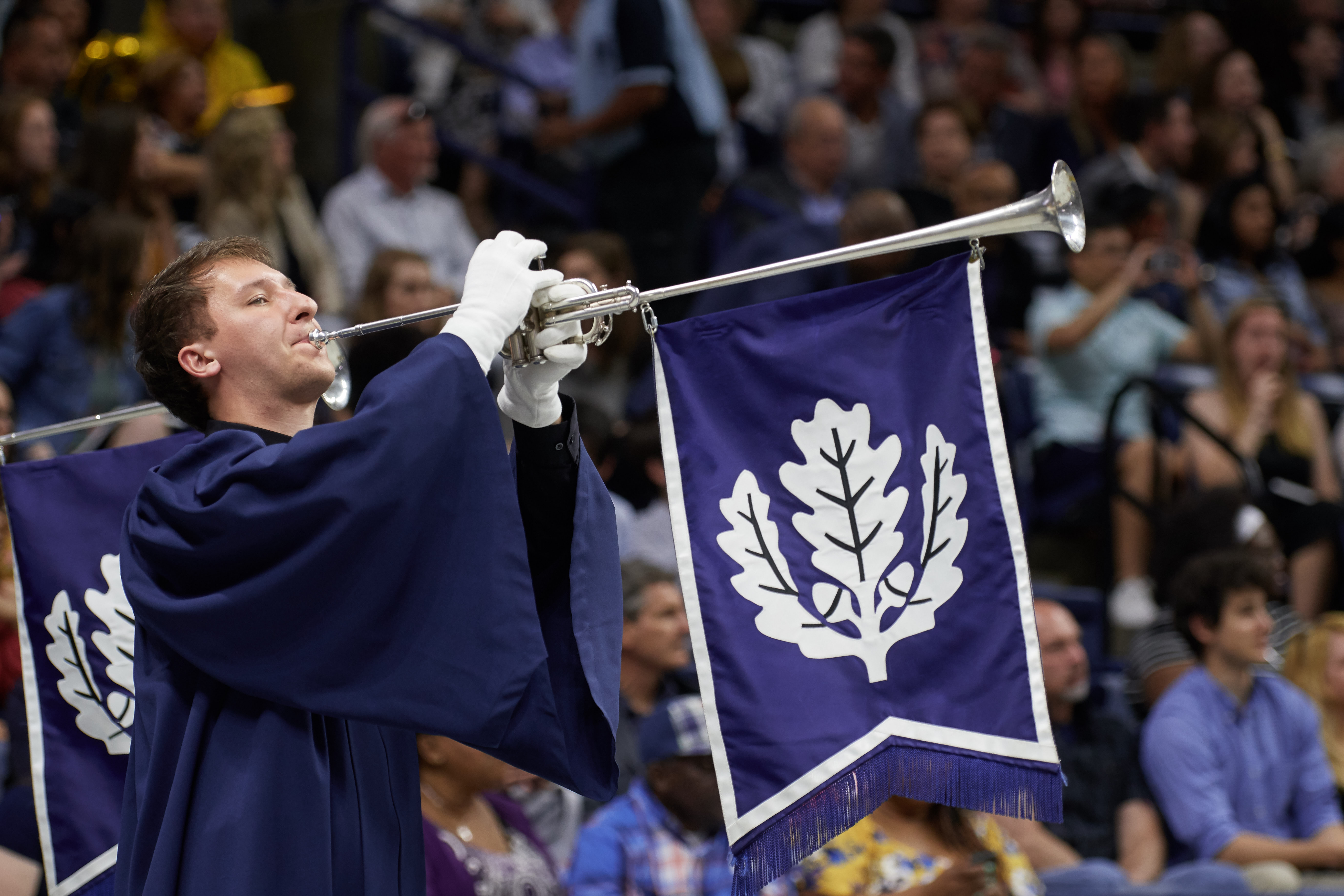 Herald pipers announce the arrival of the faculty during the College of Agriculture, Health, and Natural Resources commencement ceremony at Gampel Pavilion on May 11, 2019. (Peter Morenus/UConn Photo)