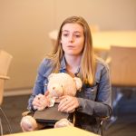 Kaitlin DiPietro ’20 (NUR), shares her experience of creating a teddy bear and tablet combo to assist those suffering from delirium in hospitals. (Lucas Voghell ’20 (CLAS)/UConn Photo)