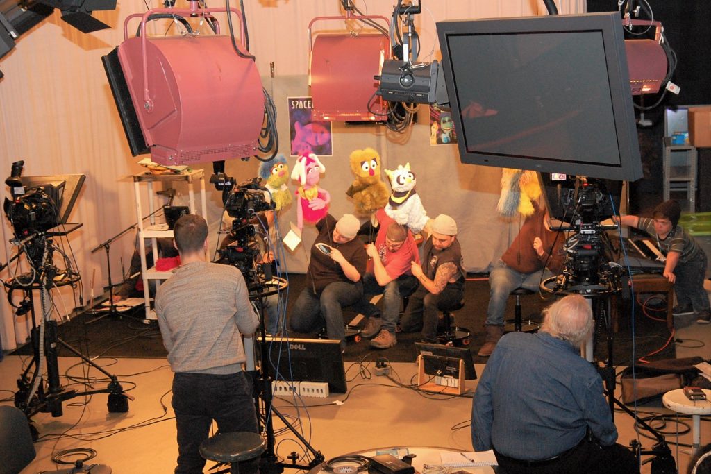 Puppeteers rehearsing “Spacebus 9” at the television studio at the Jorgensen Center for the Performing Arts