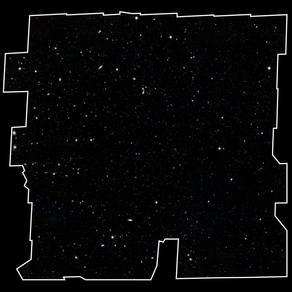 This image, a mosaic of nearly 7,500 separate Hubble exposures, presents a wide portrait of the distant universe and contains roughly 265,000 galaxies that stretch back through 13.3 billion years of time to just 500 million years after the universe's birth in the Big Bang. (Space Telescope Science Institute Image)