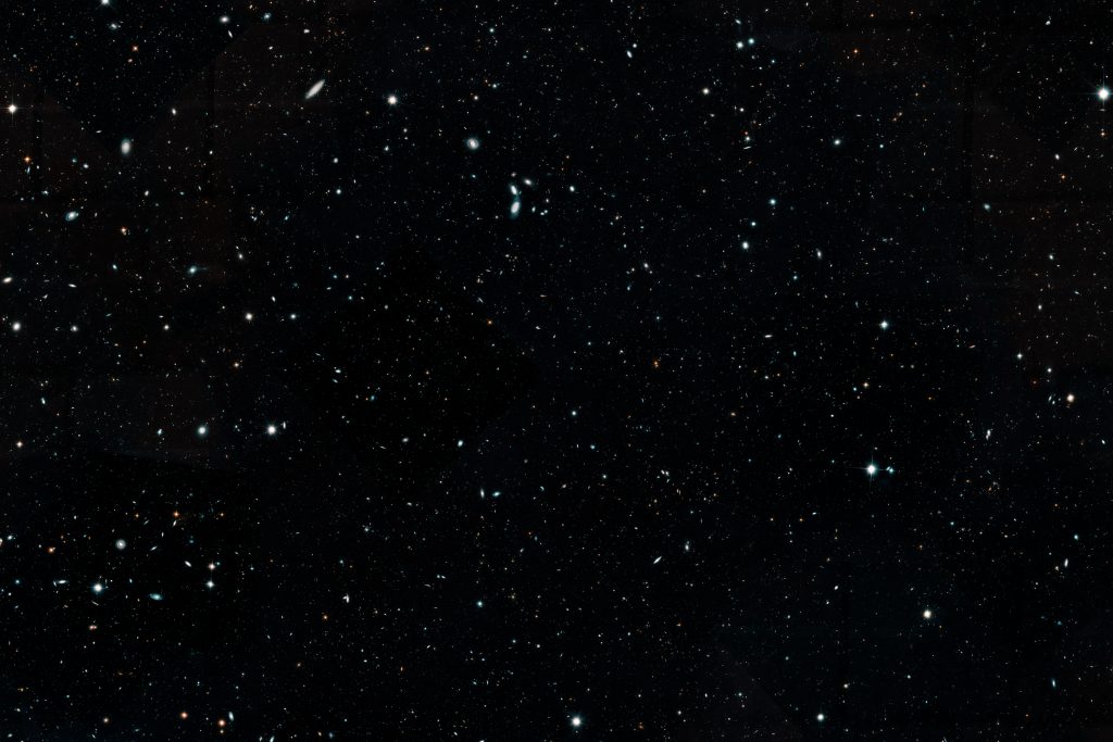 UConn astronomer Katherine Whitaker played a lead role in cataloging deep space images from 16 years’ worth of Hubble Telescope observations. This composite image represents the largest, most comprehensive ‘history book’ of galaxies in the universe. The image is cropped here to fit. (Space Telescope Science Institute Image)