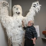 Bart Roccoberton being 'attacked' by a giant polar bear created for 'A Winter’s Tale.' (Sean Flynn/UConn Photo)