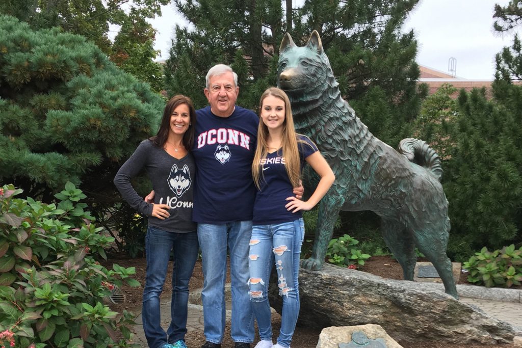 The Fochi family has a long and proud connection to the University of Connecticut because they believe it provides a great education for the money. Pictured above is alumnus Bill Fochi ’63 with his daughter, Kerry Fochi Sanders ‘94, and his granddaughter Ashley Fochi ‘19. (Contributed photo).