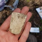 A prehistoric stone axe, possibly Neolithic, found north of Banja e Pejës. Through analysis of the artifacts found, the researchers hope to identify key archaeological sites for future study. (Elic Weitzel/UConn Photo)
