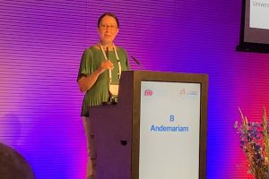 Dr. Biree Andemariam presented her latest phase 2 clinical trial findings in Amsterdam at the European Hematology Association meeting in June 2019. (Photo by Willem Scheele, Imara Inc.)