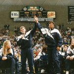 Jamelle Elliott and head coach Geno Auriemma celebrate the 1995 Women’s Basketball NCAA Championship, the first in school history, at a welcome home rally in Gampel Pavilion. (Athletic Communications)