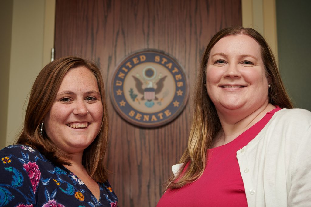 Social work student Tess Leone, left, an intern at U.S. Sen. Richard Blumenthal's office in Hartford, with outreach organizer Ellen Graham '06 MSW. (Peter Morenus/UConn Photo)