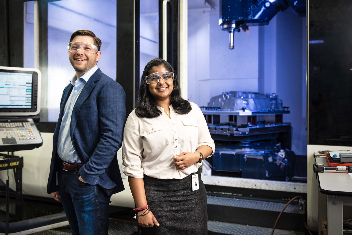 MBA student Don Pendagast (left) and MSBAPM student Chitra Reddy (right), were on a six person team dedicated to helping PCX Aerospace improve their critical data-collection systems. (Nathan Oldham / UConn School of Business)