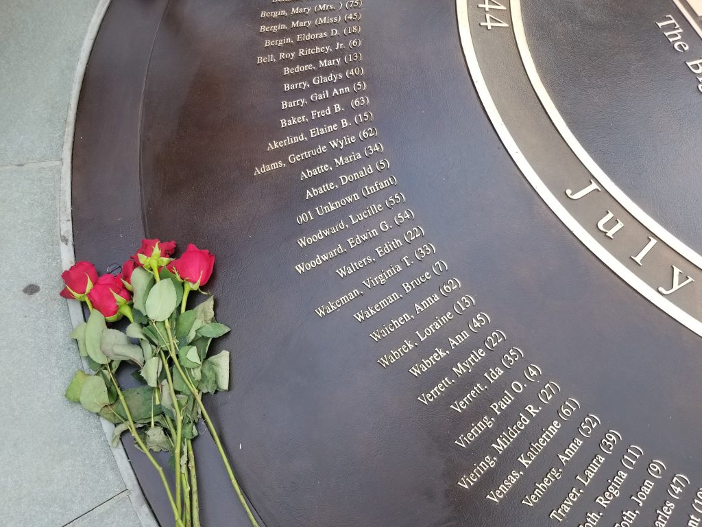 A plaque listing the names of those who died in the Hartford Circus Fire, including UConn agriculture dean Edwin Woodward and his wife Lucille. The plaque is part of the Hartford Circus Fire Memorial site at 350 Barbour St. in Hartford. (Mike Enright/UConn Photo)