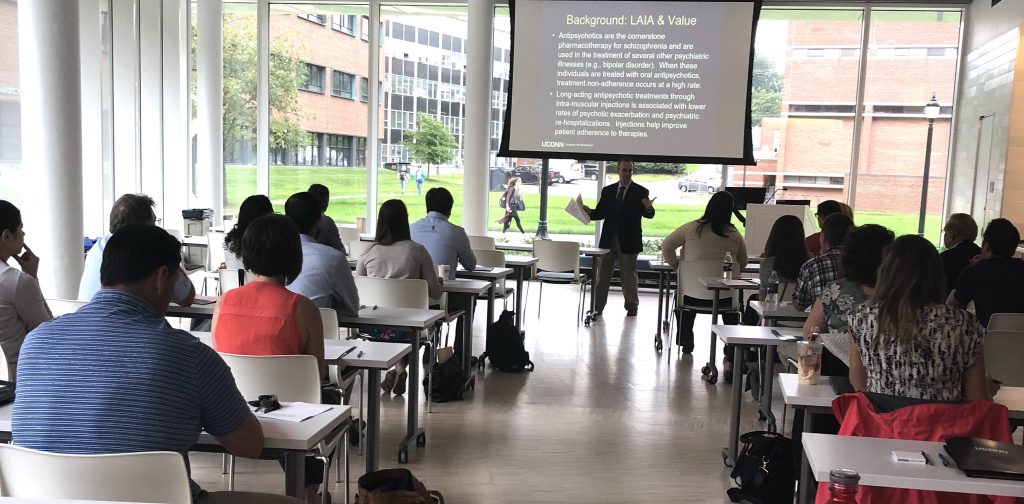 Nathaniel Rickles leads a pharmacy continuing education at UConn.