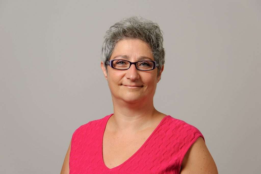 Marie Coppola, assistant professor of psychology on Aug. 11, 2016. (Peter Morenus/UConn Photo)