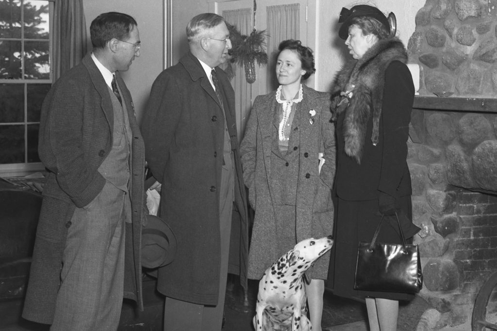 In this 1943 photo with First Lady Eleanor Roosevelt (right) are, from left, farm management professor Paul Putnam and agriculture dean Edwin G. Woodward. The woman standing next to the First Lady is not identified. (University Library Archives &amp; Special Collections)